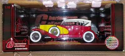 NIB 1/18 GREENLIGHT 1934 DUESENBERG II SJ DUAL-COWL PHAETON with paint issues. - Image 1 of 4