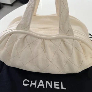 Authentic CHANEL Deerskin Stitched Bowler in White - Picture 1 of 18