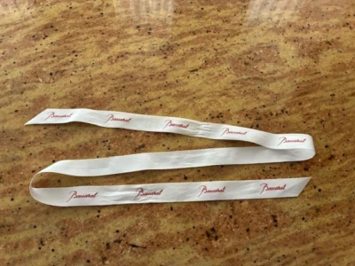 Baccarat White with Red Logo Ribbon 1" wide x 48" long - Image 1 of 3