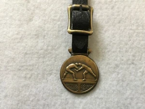 Reloj vintage FOB para dos luchadores - Imagen 1 de 3