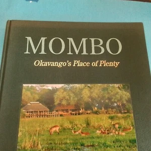 MOMBO: OKAVANGO'S PLACE OF PLENTTY, NATIONAL TCA BOOK COMMITEE, 1ST ED. 2004 HC - Imagen 1 de 22
