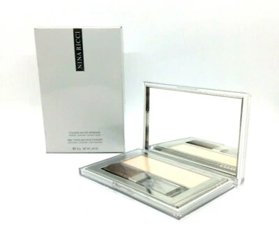 Polvo facial transparente prensado Nina Ricci 0,35 oz/10 g Select Color R69 Foto 1 de 3