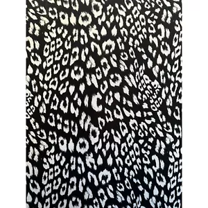 Black and White LEOPARD ROSETTE Pattern Stretch Fabric 64" x 1.5 yards - Picture 1 of 3