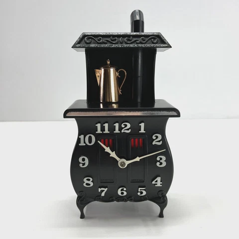 60s Spartus Pot Belly Stove Electric Wall Clock Cast Iron Style Made of Plastic Cover