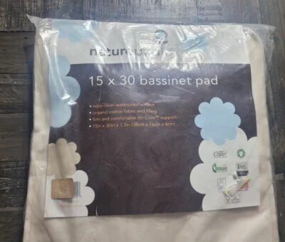 Organic Naturepedic Waterproof bassinet Pad 15x30 (plastic wrap has damage)  - Image 1 of 4