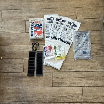 Oreck Lot Of (4)Vacuum Bags/2 Belts/ 2 Air Purifier Filters And VariedScent Tabs - Image 1 of 4