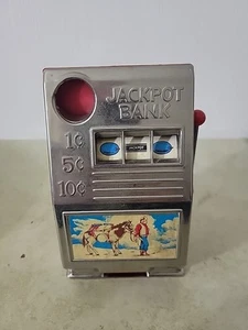 Vintage Reno Kunststoff Mfg, Co. Spielzeug Spielautomat Coin Bank Jackpot Bank - Bild 1 von 7