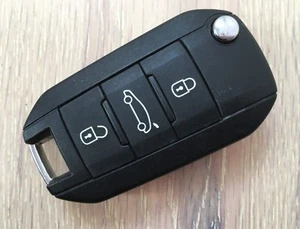 Llavero abatible remoto usado Peugeot 3 botones 434 MHz Hella 5F A010 353-00 - Imagen 1 de 2