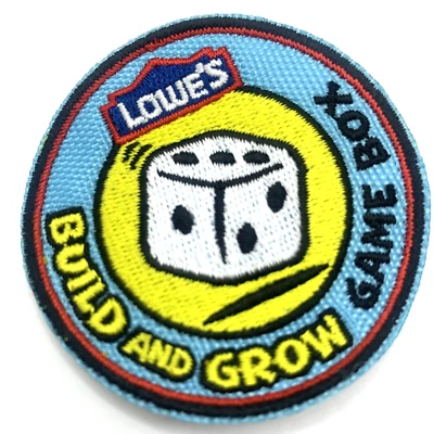 Caja de juego de parches para construir y crecer Lowes niños insignia de finalización de proyecto de madera Foto 1 de 3
