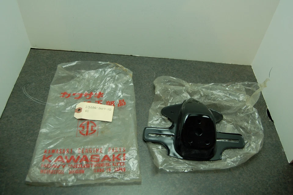 NOS Kawasaki 23036-007-10 LICENSE PLATE BRACKET METAL H1 F9 F8 F7 F6 F5 G4 MACH - Image 1 of 4