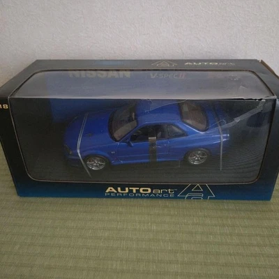 AUTOart 1/18 Nissan Skyline GT-R R34 V-Spec II Bayside Blue Japan New Box Damage - Image 1 of 4
