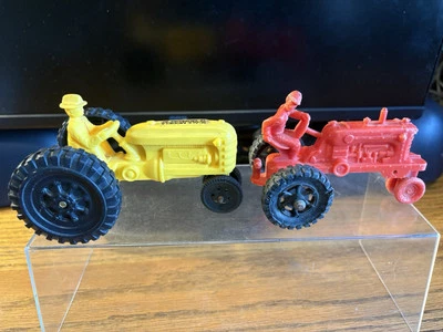 Scale Models 1982 National Farm Toy Yellow Plastic Tractor w/ Man+RED TRACTOR - Image 1 of 4