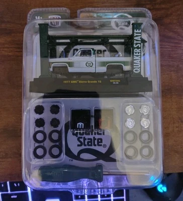 M2 Machines Model Kit - Quaker State Green/White 1977 GMC Sierra Grande 15 1:64 - Image 1 of 2