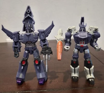 Deformation Toys Dx9 Decepticon Galvatron Cyclonus Juego de 2 figuras stock JUGUETES Foto 1 de 2