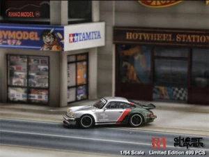 Coche modelo verde plateado Ghost Player 1:64 Singer Turbo Study 930 - Imagen 1 de 4