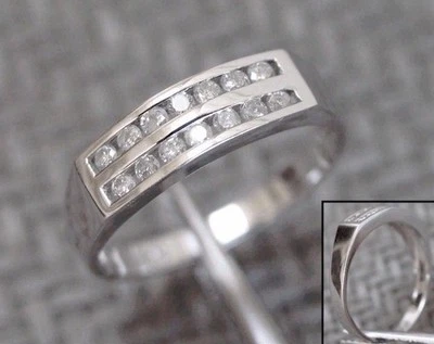 NOS FOURTEEN KARAT WHITE GOLD 5mm BAND RING WITH 14 NATURAL DIAMONDS (size 6.5) - Image 1 of 3