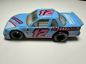 Coche de carreras Chevrolet Lumina vintage de los años 90 Matchbox azul #12 Goodyear - Imagen 1 de 6