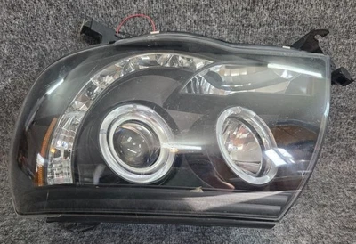 Conjunto de faros izquierdos Toyota Tacoma 2008 OEM carcasa sonar S8302 no oculto 12 V Foto 1 de 4