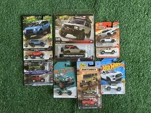 Set camion ventilatori Toyota Hot Wheels 2025 (11 auto) - Foto 1 di 12