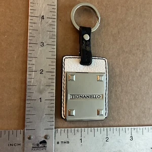 Tignanello Plata Brillante Sobre Cuero Gris Claro - Etiqueta Llave/Bolso - Imagen 1 de 5