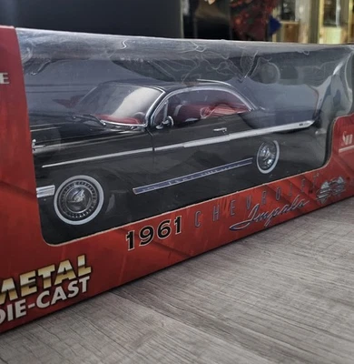 Chevrolet Impala SS 409 1961 SUN STAR (NEGRO) ESCALA 1:18 NUEVO Foto 1 de 4