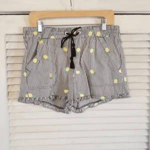 Pantalones Cortos Jolt Rayas Piña Volantes Negro Blanco L - Imagen 1 de 9