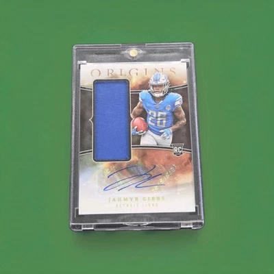 2023 Panini Origins Jahmyr Gibbs Rookie Jumbo Patch Auto No. RJJA-JG - Image 1 of 2