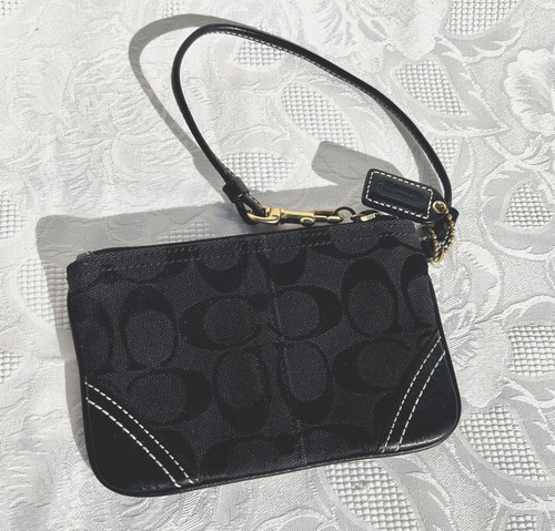 Bracciale Coach vintage anni 2000 sig. Corpo in tessuto nero con angoli in pelle nera