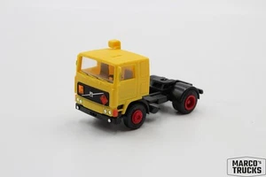 Herpa Volvo F10 tractor unit red/yellow/black 1:87 /H23115 - Picture 1 of 1