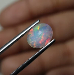 8x10 MM Oval Cut 1.2 Cts Natural AAA Red Green Fire Faceted Ethiopian Opal - Picture 1 of 6
