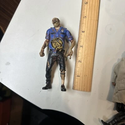 VINTAGE RESIDENT EVIL 2 VIDEO GAME SUPERSTARS ZOMBIE COP FIGURE 1998 TOYBIZ - Image 1 of 3