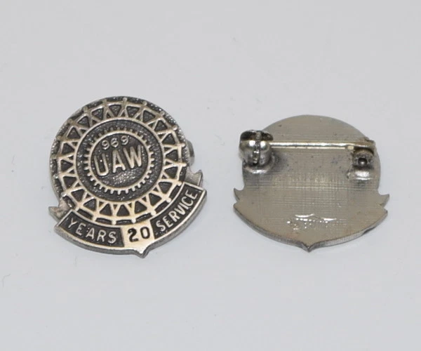 Prendedor de solapa esterlina United Automobile Workers 969 UAW 20 años de servicio sindical Foto 1 de 1