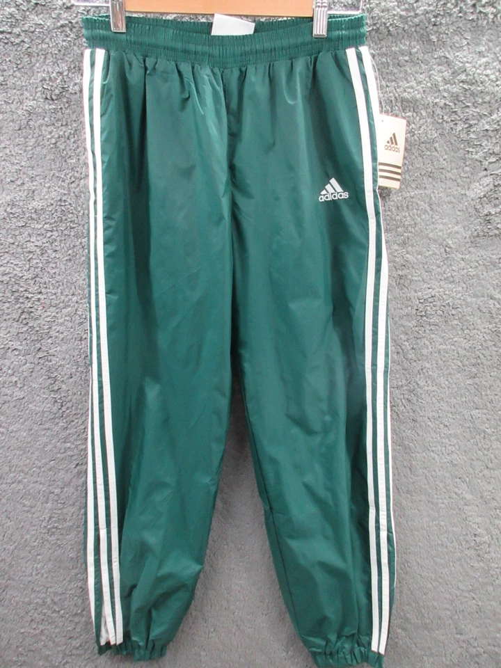 Nuevo con etiquetas Raro Años 90 Adidas Vintage Nylon Forrado Verde Pantalones de Pista Juveniles Grandes Foto 1 de 4