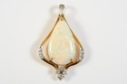 O10A10- Gold 750 18kt Anhänger nat. Diamanten ca. 0,62 ct Opal ca. 28x16 mm