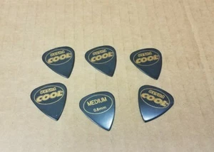 6 x Cool 0,80 mm Ultra SR Standard Gitarrenplektren gummierter Griff Serie Cellulon - Bild 1 von 2