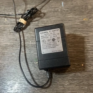 Original Casio AD-5U Teclado Fuente de Alimentación Adaptador CA 9V 700mA - Imagen 1 de 3