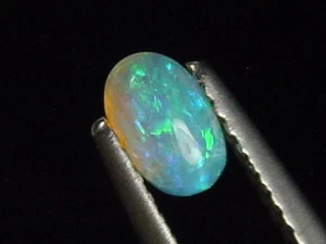 Opal / Edelopal 0,33 Ct. Oval Cabochon Australien (5156t) - Bild 1 von 1