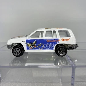 Realtoy Jeep Grand Cherokee ~1:64 Diecast SUV National Zoo/Wonderful World Tampo - Picture 1 of 10