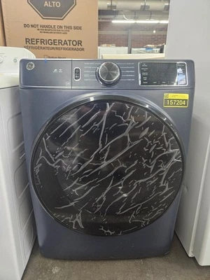 Secadora eléctrica de carga frontal GE GFD55ESPRRS 28" azul zafiro nueva en caja #157204 Foto 1 de 4