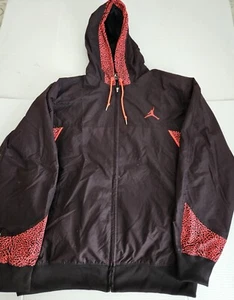 CHAQUETA LIGERA CON CAPUCHA AIR JORDAN CREMALLERA COMPLETA NEGRA NARANJA TALLA 2XL - Imagen 1 de 12