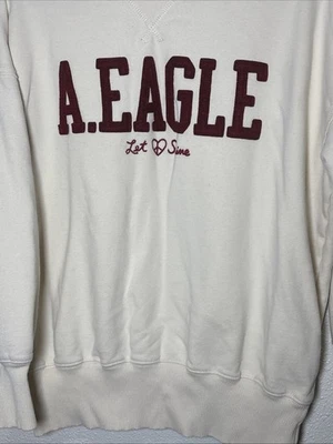 Sudadera American Eagle polar cuello redondo mujer “Let Love Smile” talla pequeña Foto 1 de 4
