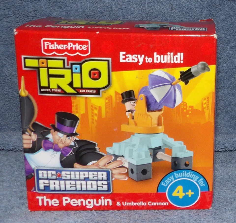 FISHER PRICE TRIO DC SUPER FRIENDS THE PENGUIN & UMBRELLA CANNON SET - Image 1 of 4