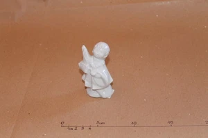PORCELLANA - CANTORE DI NATALE 1 - D4xH8cm - Picture 1 of 1