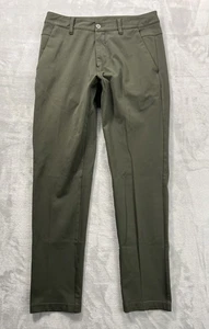 Pantalón chino elástico Bylt Everyday para hombre mediano 28" entrepierna verde oscuro rendimiento - Imagen 1 de 10