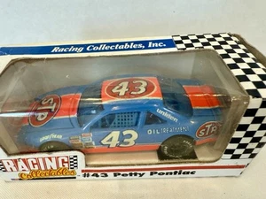 Revell Racing Collectables Inc NASCAR #43 Richard Petty STP Pontiac 1/64 NOS - Picture 1 of 3