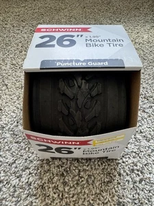 SCHWINN 26"X 1.95" MOUNTAIN BIKE TIRE, PUNCTURE GUARD - Picture 1 of 3