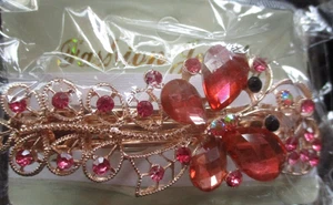 Joyería de moda nueva en bolsa sellada.  Clip de pelo dorado y rosa. Caja de regalo - Imagen 1 de 4