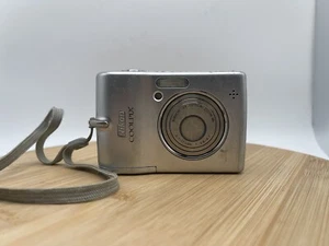 Nikon COOLPIX L12 7.1MP Digital Camera - Matte silver for Parts or Repair - Picture 1 of 9