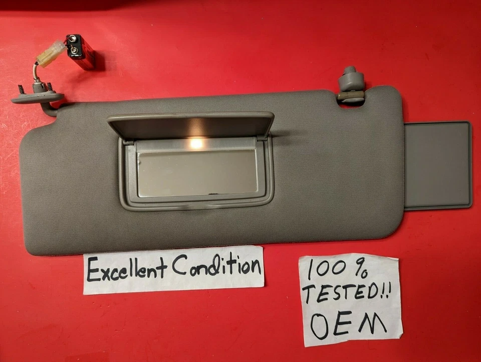 ✅OEM 04-15 NISSAN ARMADA TITAN SUNVISOR DRIVER Left ILLUMINATED ROOF CLIP GRAY - Image 1 of 4