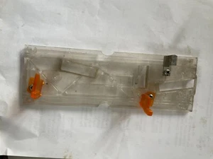 OLD ORANGE MARS COIN MECH SUPPORT CLIPS - Picture 1 of 3